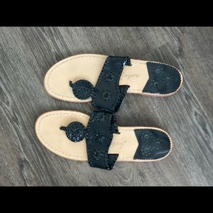 Women’s size 7.5 black Jack Rogers sandals.